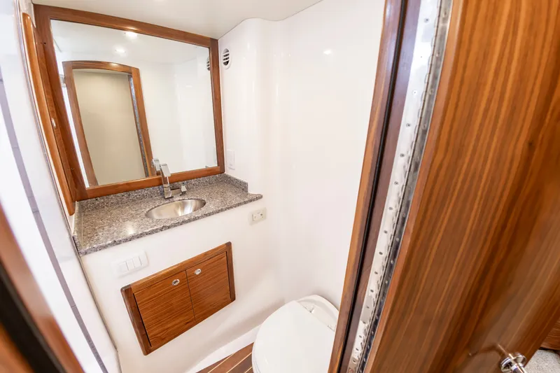 Slide: The Image of Luxurious bathroom in the 2024 Albemarle Spencer Edition boat. - 43