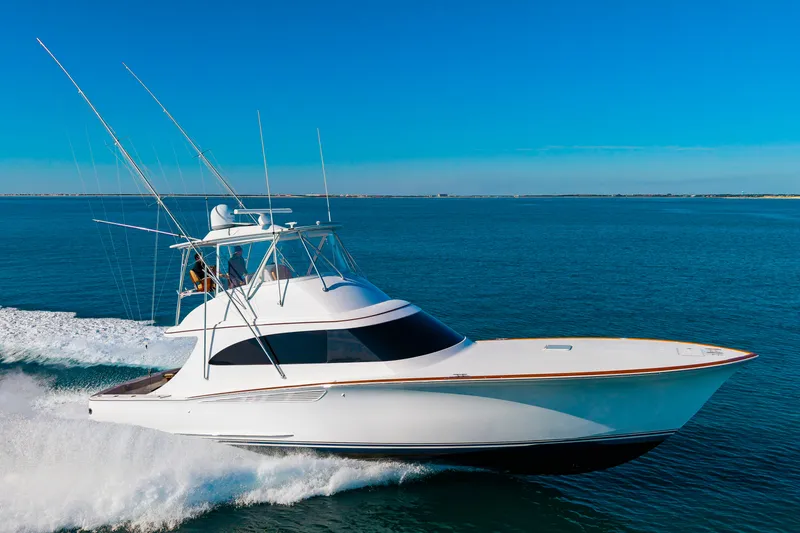 Slide: The Image of 2024 Albemarle Spencer Edition yacht cruising on open sea. - 7