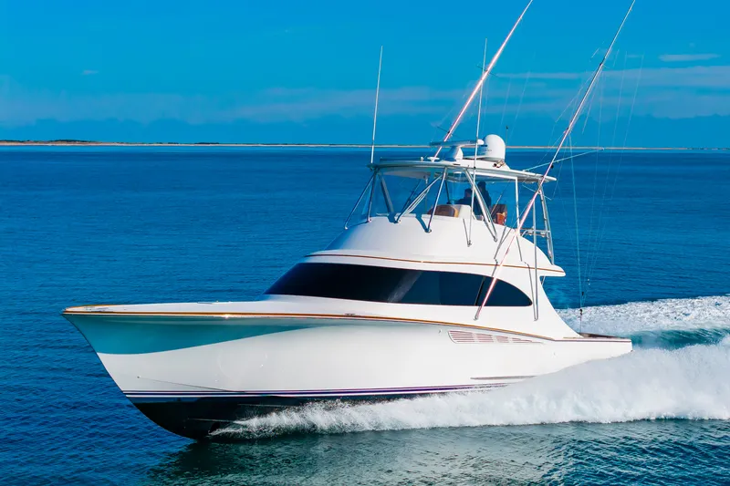 Slide: The Image of 2024 Albemarle Spencer Edition yacht cruising on open sea. - 8