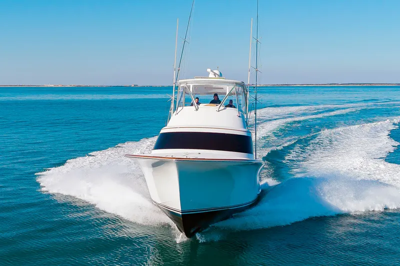 Slide: The Image of 2024 Albemarle Spencer Edition yacht cruising on open sea. - 9