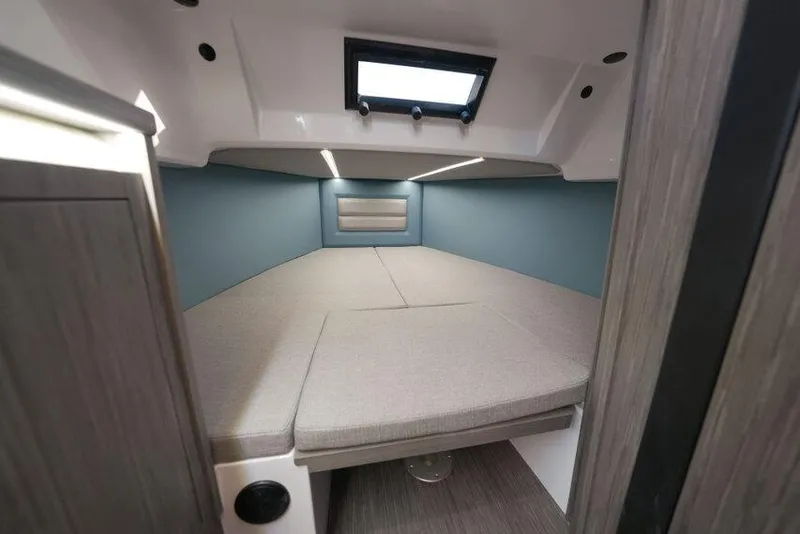 Slide: The Image of 2026 Ranieri CAYMAN 33.0 EXECUTIVE cabin interior with modern design and comfortable bedding. - 12