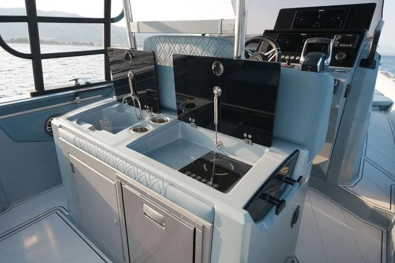 Slide: The Image of Luxury yacht kitchen area on 2026 Ranieri CAYMAN 33.0 EXECUTIVE, featuring modern appliances. - 20