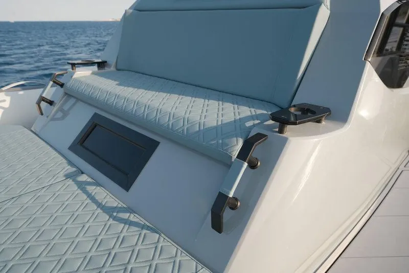 Slide: The Image of Luxury seating on 2026 Ranieri CAYMAN 33.0 EXECUTIVE boat, featuring elegant design and ocean backdrop. - 29