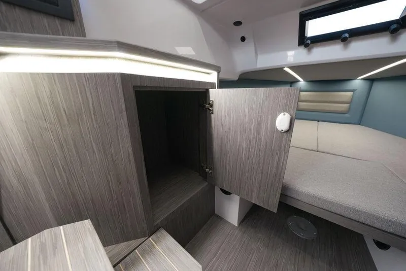 Slide: The Image of Interior of 2026 Ranieri CAYMAN 33.0 EXECUTIVE with open cabinet and modern design. - 7