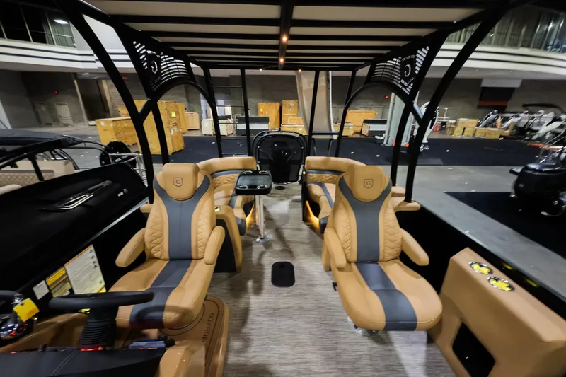 Slide: The Image of Luxurious interior of 2026 Godfrey Monaco 255 Sun Deck boat with plush seating and modern design. - 12