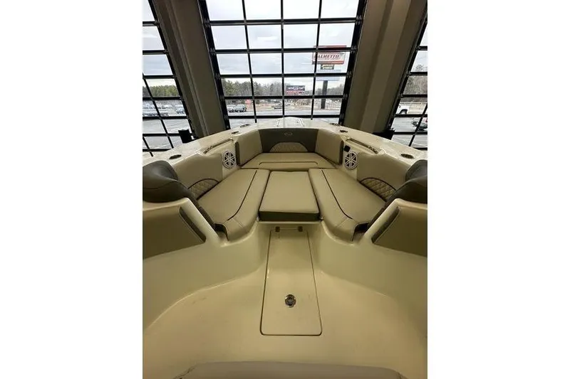 Slide: The Image of 2026 Key West 263 FS boat interior with open door revealing compact cabin space. - 15