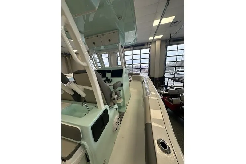 Slide: The Image of 2026 Key West 263 FS boat with dual engines and comfortable seating. - 26