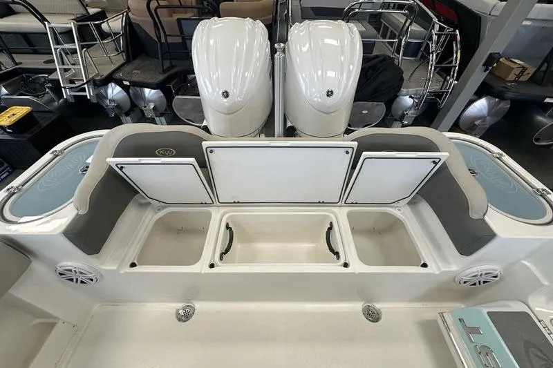 Slide: The Image of 2026 Key West 263 FS boat with foldable ladder and sleek design. - 29