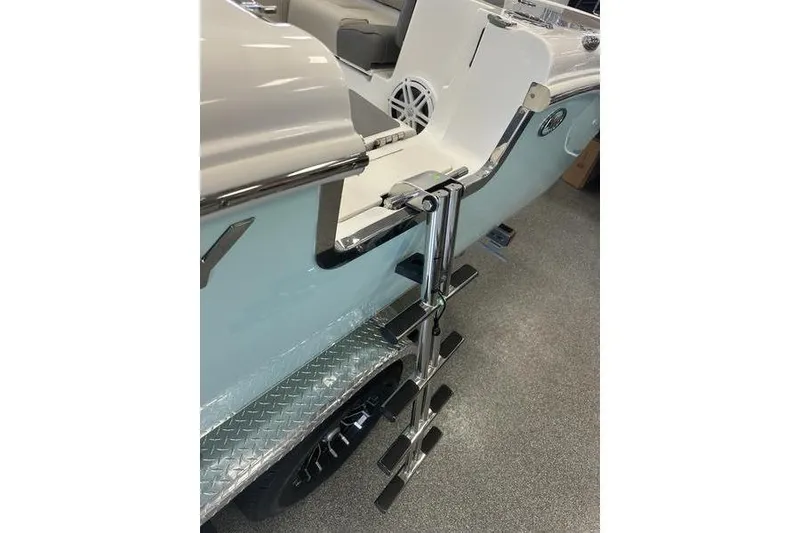 Slide: The Image of 2026 Key West 263 FS boat interior with seating and speaker detail. - 30