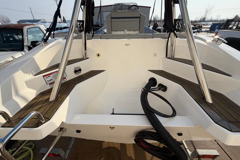 Slide: The Image of 2023 Cobra Ribs Nautique 7.0m boat interior with sleek design and modern features. - 14