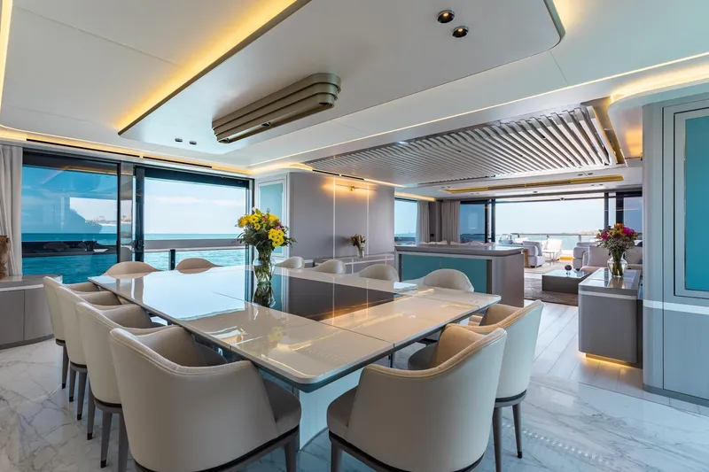 Slide: The Image of Luxurious interior of 2024 Mangusta Oceano 44 yacht with elegant dining area and ocean view. - 17