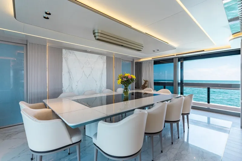 Slide: The Image of Luxurious dining area on 2024 Mangusta Oceano 44 yacht with ocean view. - 18