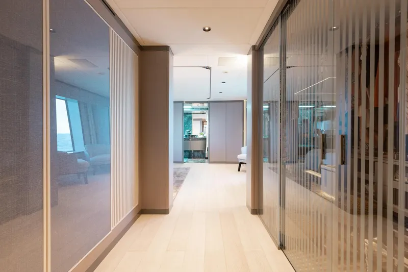 Slide: The Image of Luxurious interior hallway of 2024 Mangusta Oceano 44 yacht, featuring modern design and elegant finishes. - 19