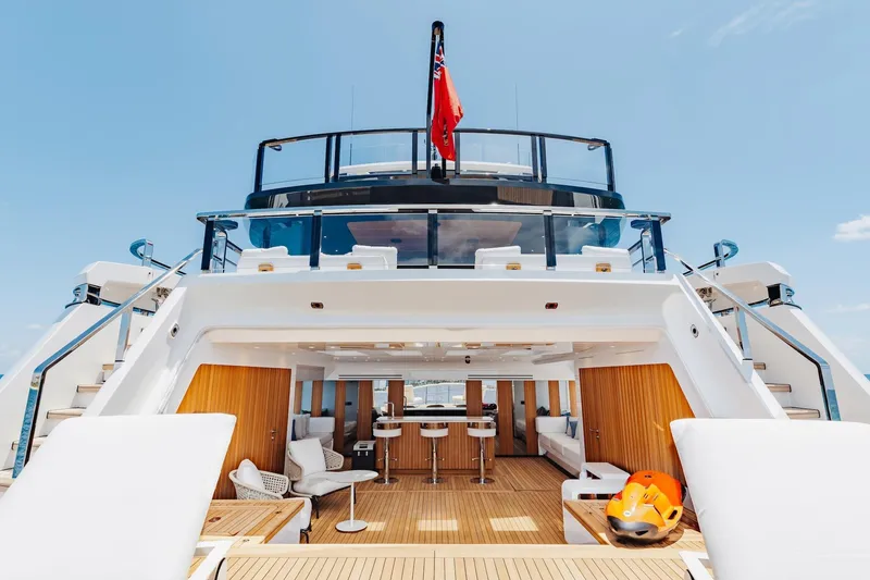 Slide: The Image of Luxurious 2024 Mangusta Oceano 44 yacht deck with modern seating and sleek design. - 28