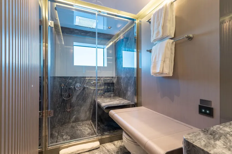 Slide: The Image of Luxurious bathroom in 2024 Mangusta Oceano 44 yacht with marble shower and modern fixtures. - 33