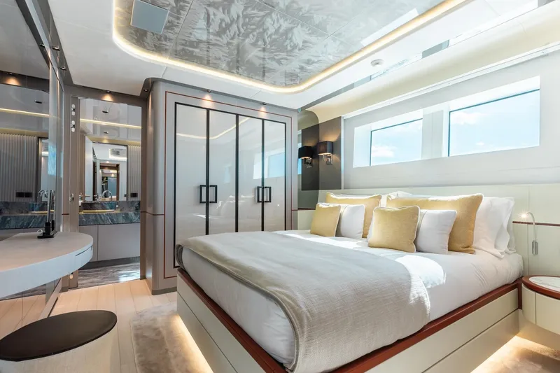 Slide: The Image of Luxurious bedroom interior of 2024 Mangusta Oceano 44 yacht, featuring elegant design and modern amenities. - 36