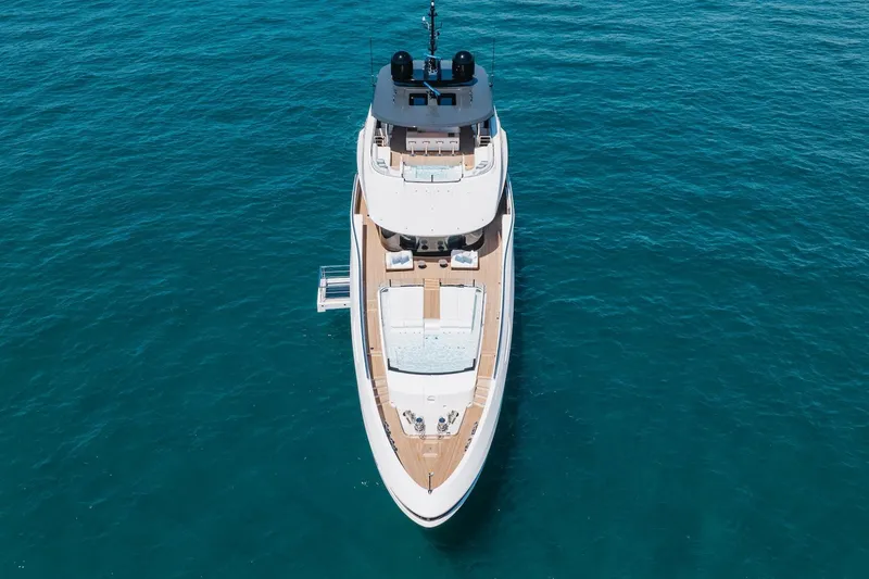 Slide: The Image of 2024 Mangusta Oceano 44 yacht on open sea, aerial view. - 4