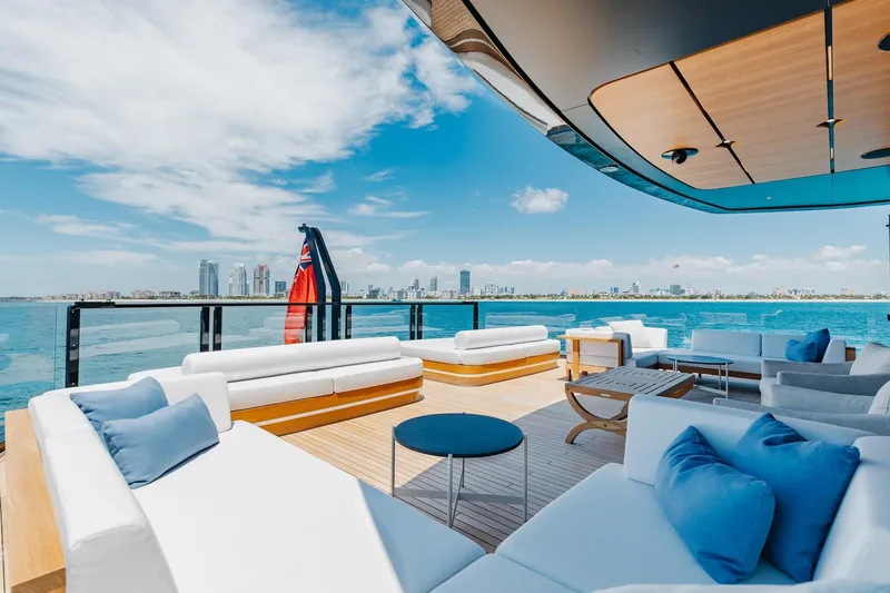 Slide: The Image of Luxurious 2024 Mangusta Oceano 44 yacht deck with city skyline view. - 48