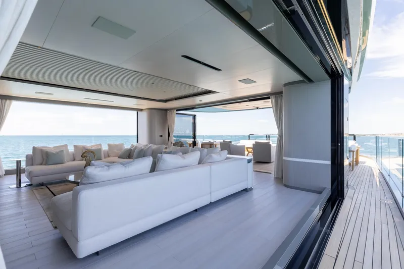 Slide: The Image of Luxurious interior of 2024 Mangusta Oceano 44 yacht with ocean view and elegant seating. - 51
