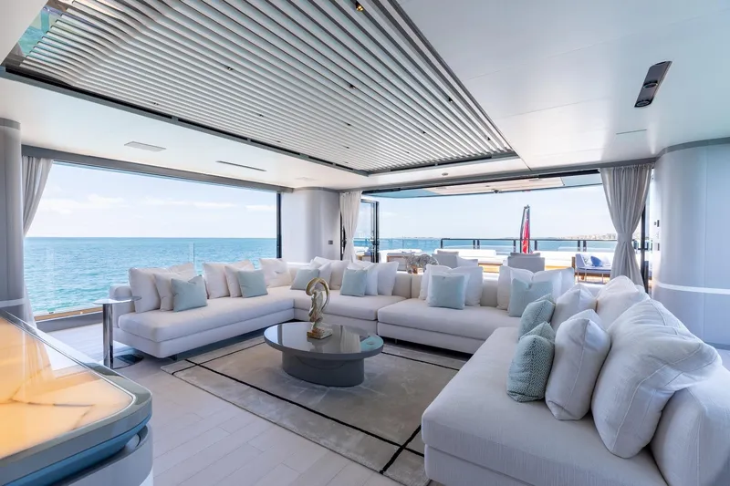 Slide: The Image of Luxurious interior of 2024 Mangusta Oceano 44 yacht with ocean view and elegant seating. - 52