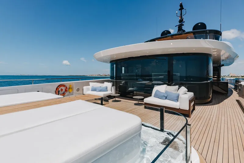Slide: The Image of Luxurious 2024 Mangusta Oceano 44 yacht deck with modern seating and ocean view. - 58