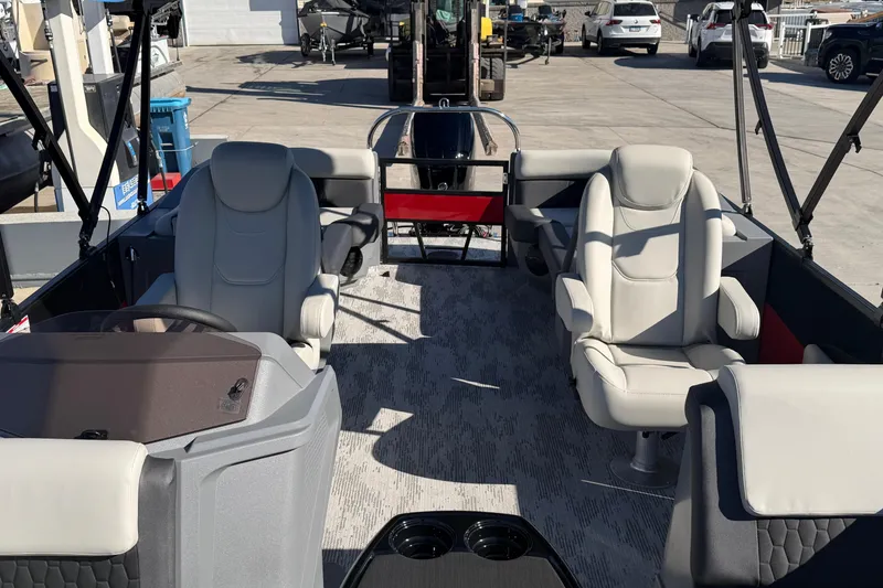 Slide: The Image of 2026 Sylvan R-22 LZ DH boat interior with plush seating and modern design. - 7