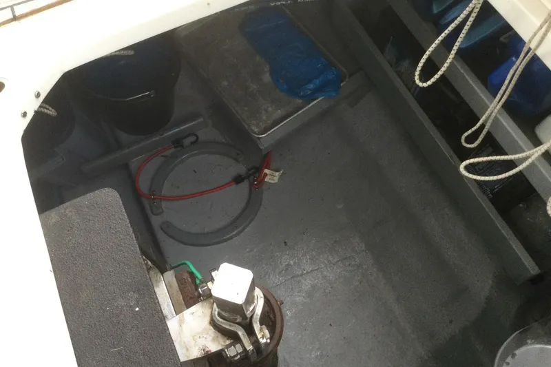 Slide: The Image of 2001 Nordhavn 46 boat interior showing storage area with ropes and equipment. - 67