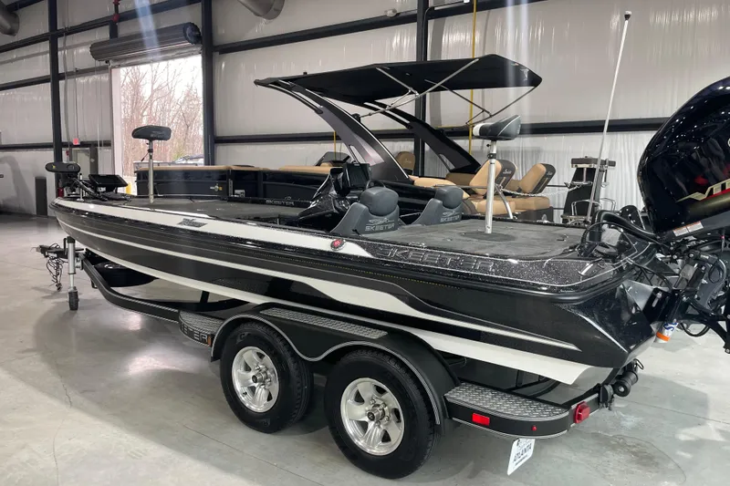 The Image of 2018 Skeeter ZX250 boat in showroom, featuring sleek design and dual seats. - 0