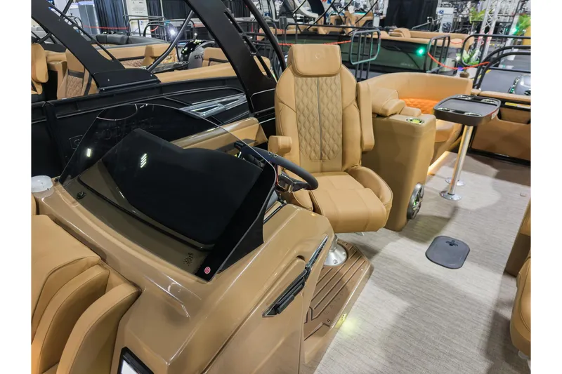 Slide: The Image of Luxurious interior of 2026 Godfrey SanPan 25' Split Bench Co-Captain pontoon boat. - 18