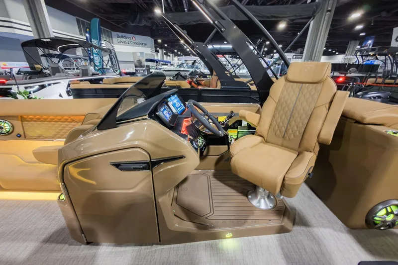 Slide: The Image of 2026 Godfrey SanPan 25' Split Bench Co-Captain boat interior with luxurious captain's chair. - 19