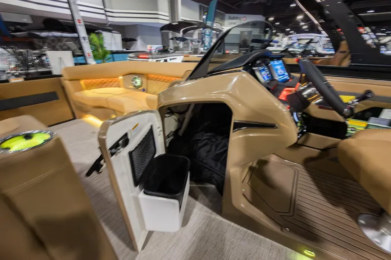 Slide: The Image of 2026 Godfrey SanPan 25' Split Bench Co-Captain interior with modern dashboard and seating. - 29