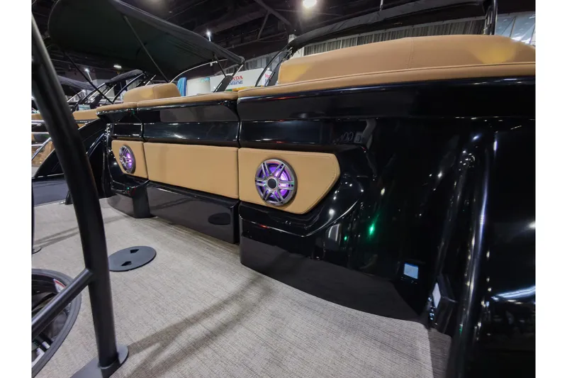 Slide: The Image of 2026 Godfrey SanPan 25' Split Bench Co-Captain boat interior with illuminated speakers. - 39