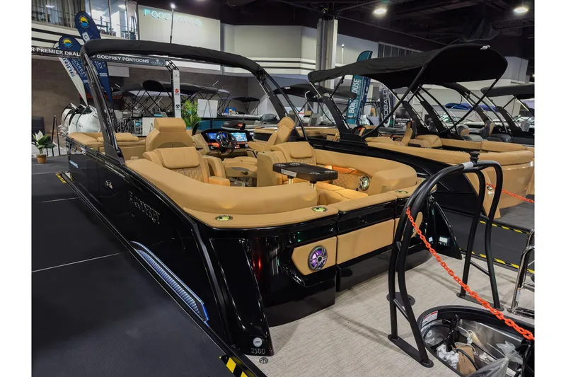 Slide: The Image of 2026 Godfrey SanPan 25' Split Bench Co-Captain pontoon boat with luxurious seating and modern design. - 7