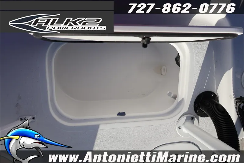 Slide: The Image of 2026 ALK2 Powerboats 17HS storage compartment, Antonietti Marine branding, contact number visible. - 11