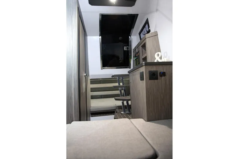 Slide: The Image of Interior of 2026 Ranieri CAYMAN 35.0 EXECUTIVE yacht, featuring modern design and seating. - 17