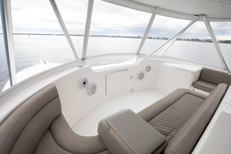 Slide: The Image of Luxurious interior of 2007 Viking 68 Convertible yacht with panoramic windows and plush seating. - 22