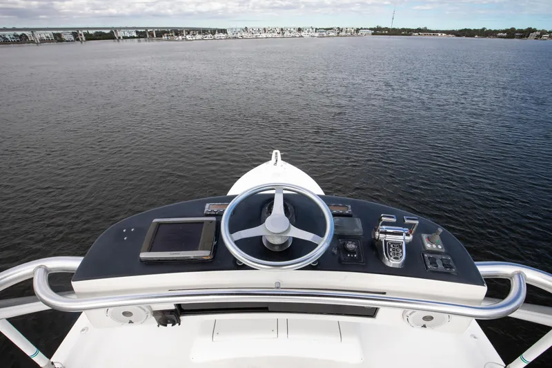 Slide: The Image of Helm of 2007 Viking 68 Convertible yacht with water view. - 24
