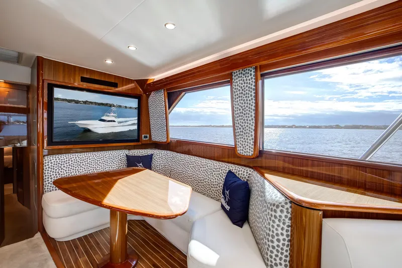 Slide: The Image of Luxurious interior of 2007 Viking 68 Convertible yacht with scenic ocean view. - 7