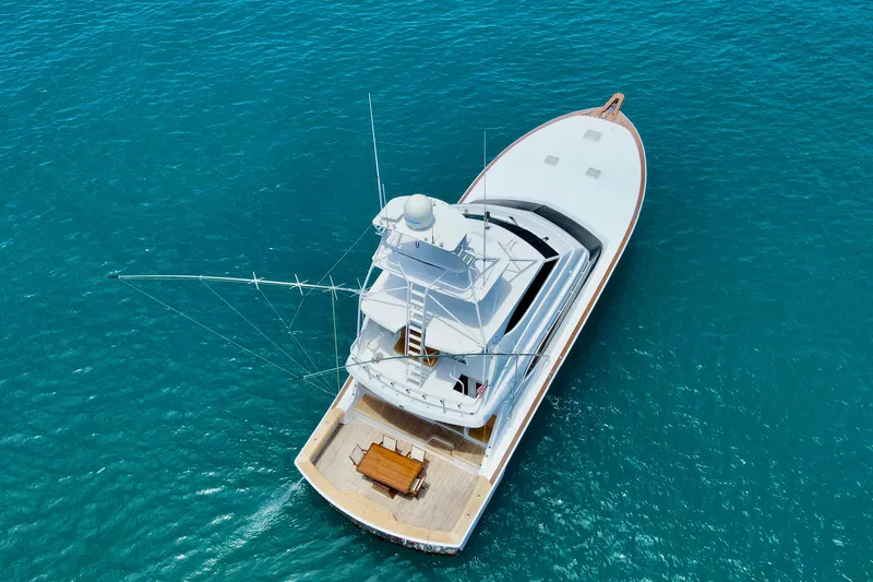 Slide: The Image of Aerial view of 2007 Hatteras 68 Convertible yacht on clear blue water. - 30