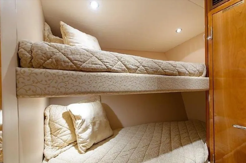 Slide: The Image of Luxurious bunk beds in 2007 Hatteras 68 Convertible yacht cabin. - 9
