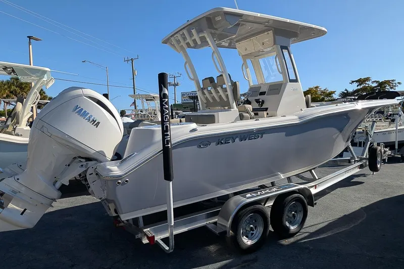 Slide: The Image of 2026 Key West 260 Center Console boat on trailer with Yamaha engine. - 2