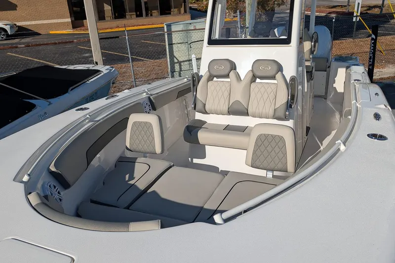 Slide: The Image of 2026 Key West 260 Center Console boat with luxurious seating and modern design. - 7