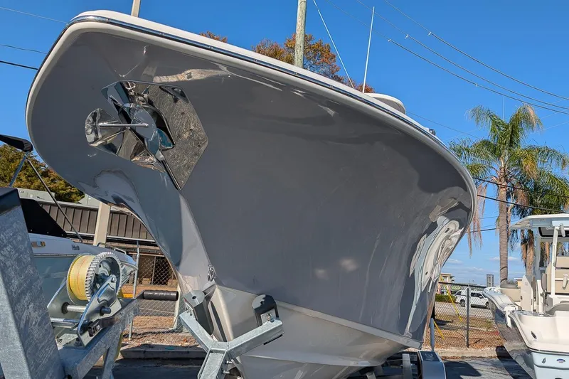 Slide: The Image of 2026 Key West 260 Center Console boat on trailer, showcasing sleek hull design. - 9