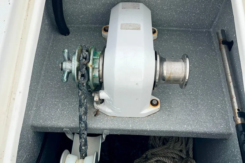 Slide: The Image of Anchor windlass on 2008 Seawind 1160 catamaran, featuring chain and rope storage. - 19
