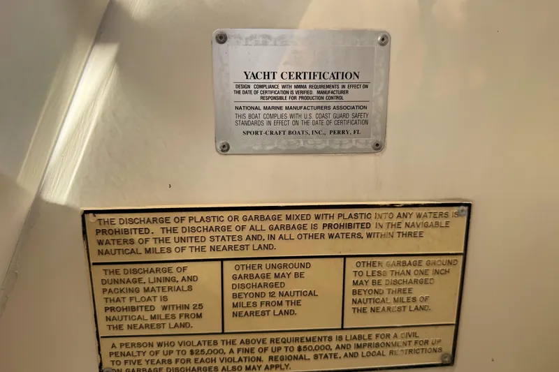 Slide: The Image of Yacht certification and waste discharge regulations on 2002 Sport-Craft 3150 Sportfish boat. - 15
