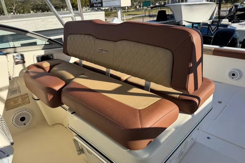 Slide: The Image of 2002 Sport-Craft 3150 Sportfish boat interior with brown leather seating. - 16