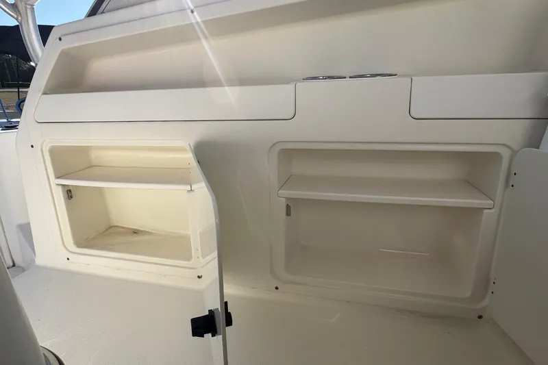Slide: The Image of 2002 Sport-Craft 3150 Sportfish boat interior storage compartments. - 23