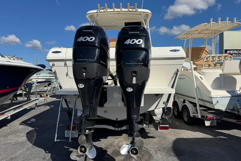 Slide: The Image of 2002 Sport-Craft 3150 Sportfish with twin 400 horsepower outboard engines. - 57
