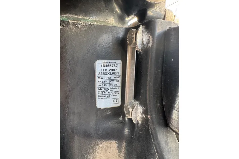 Slide: The Image of Label on a 2002 Sport-Craft 3150 Sportfish boat engine, showing specifications. - 61