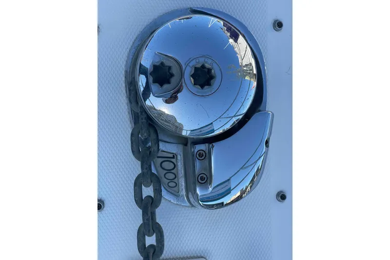Slide: The Image of Chrome anchor windlass on 2005 Sea Ray 420 Sedan Bridge yacht. - 108